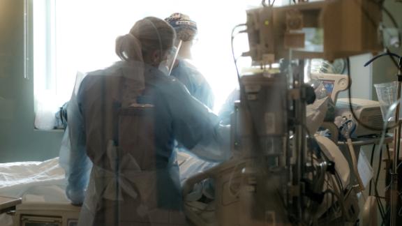 Nurses check on a patient in the ICU Covid-19 ward at NEA Baptist Memorial Hospital in Jonesboro, Arkansas, U.S., on Wednesday, Aug. 4, 2021. Mississippi and Arkansas face shortages of available intensive care beds as the delta variant sparks yet another surge in coronavirus cases around the country, reports NBC News. 