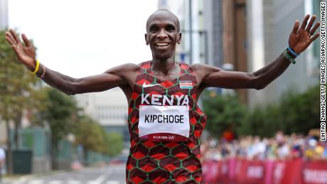 Kenyan Eliud Kipchoge celebrates after winning the gold medal in the men&#39;s marathon at the Tokyo 2020 Olympic Games.