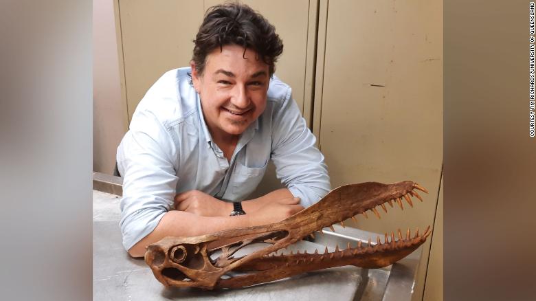 Tim Richards is pictured with the skull of an anhanguerian pterosaur. 