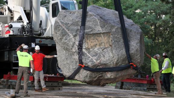 Crews work to remove Chamberlin Rock from Observatory Hill on the University of Wisconsin campus in Madison on Friday.