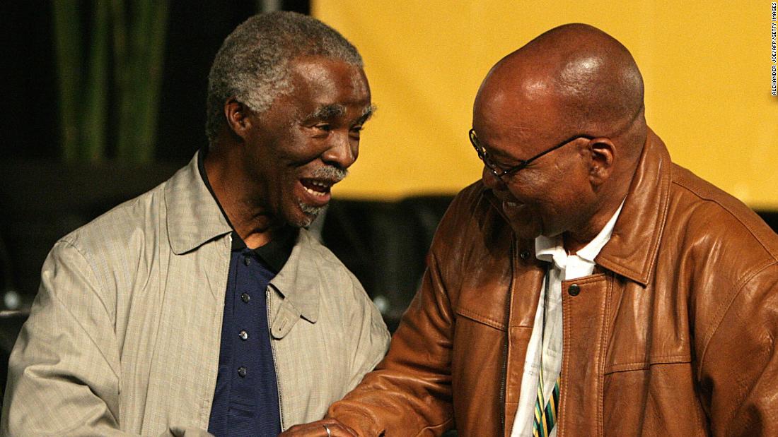 Zuma, right, is congratulated by Mbeki after defeating him to become the new president of the ANC in December 2007.