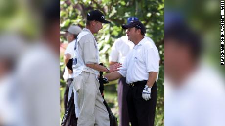 Ian Woosnam (right) stands with his caddie Miles Byrne as he explains his error during the final round of the 2001 Open Championship at Royal Lytham and St Annes.