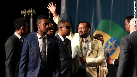 Prime Minister Abiy Ahmed waves to the Ethiopian diaspora assembled at an event in Washington, DC, in July 2018.