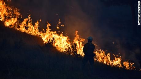 Hundreds forced to evacuate Montana wildfire as blazes rage across the West, fueled by dry conditions and high temperatures