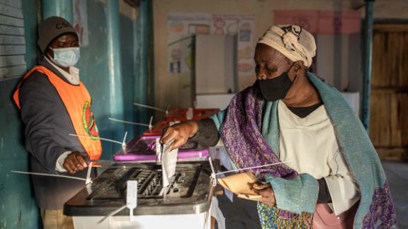 A woman casts her ballot in Lusaka after a tense campaign dominated by economic woes.