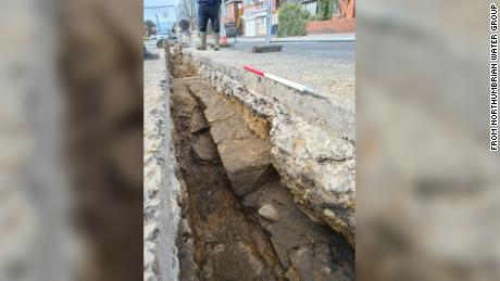 Section of Hadrian&#39;s Wall found under busy UK street during utility work