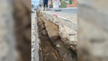 Section of Hadrian's Wall found under busy UK street during utility work
