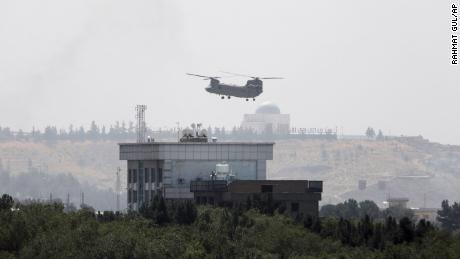 A US Chinook helicopter flies near the US embassy in Kabul on Sunday during an operation to evacuate embassy staff.