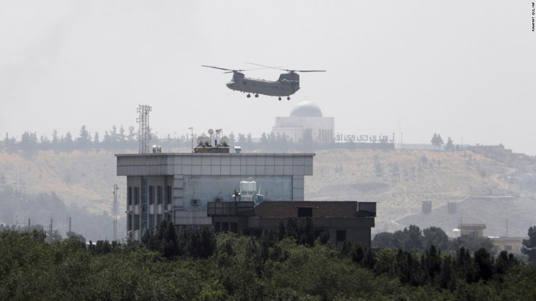 Chaos in Kabul as Taliban take power and thousands try to flee