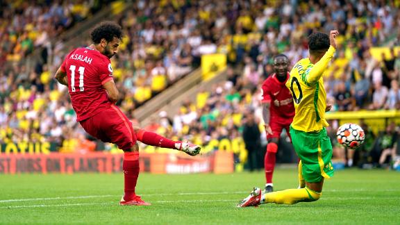 Liverpool's Mohamed Salah scores his side's third goal of the game in the 3-0 win against Norwich.