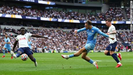 Manchester City&#39;s Jack Grealish shoots during the Premier League match against Tottenham Hotspur.