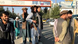 Calm and fear on the streets of Kabul as jubilant Taliban celebrate their victory