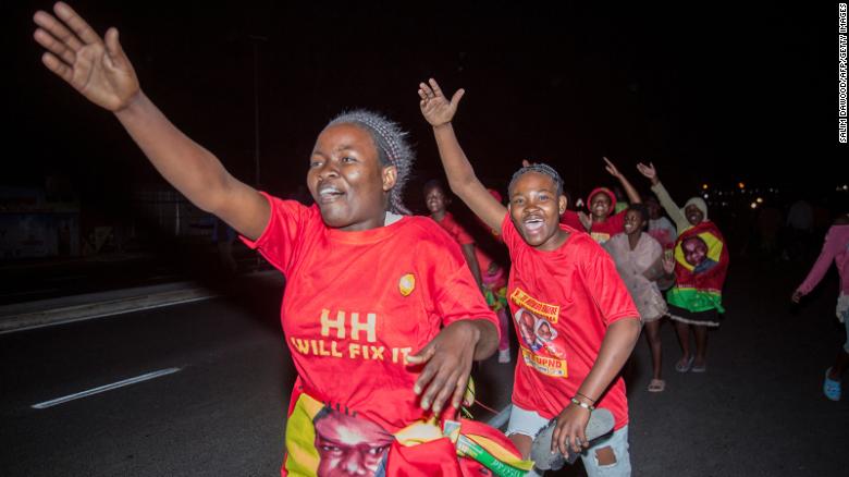 Supporters of presidential opposition candidate Hakainde Hichilema celebrate his election as Zambian President in Lusaka.