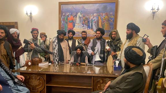Taliban fighters take control of the Afghan presidential palace in Kabul, Afghanistan, on August 15, 2021. 