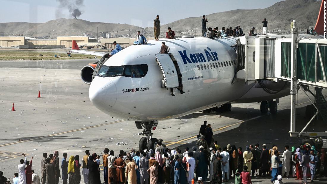 People climb atop a plane at Kabul&#39;s international airport after the Taliban retook the capital a day earlier. Hundreds of people&lt;a href=&quot;https://www.cnn.com/2021/08/16/middleeast/kabul-afghanistan-withdrawal-taliban-intl/index.html&quot; target=&quot;_blank&quot;&gt; &lt;/a&gt;poured onto the tarmac, &lt;a href=&quot;https://www.cnn.com/2021/08/16/middleeast/kabul-afghanistan-withdrawal-taliban-intl/index.html&quot; target=&quot;_blank&quot;&gt;desperately seeking a route out of Afghanistan.&lt;/a&gt;