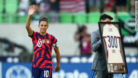 Carli Lloyd greets fans as she receives recognition from the crowd in 2021. 
