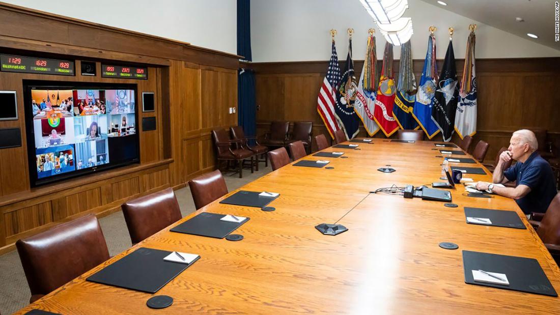US President Joe Biden holds a virtual meeting with senior officials and members of his national security team on August 15. Biden was working from Maryland's Camp David, the presidential retreat where he was vacationing at the time.