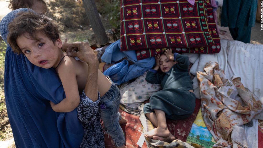 Displaced Afghans from the country's northern provinces arrive at a makeshift camp in Kabul on Tuesday, August 10. Provincial capitals in the north were among the first to fall to the Taliban.