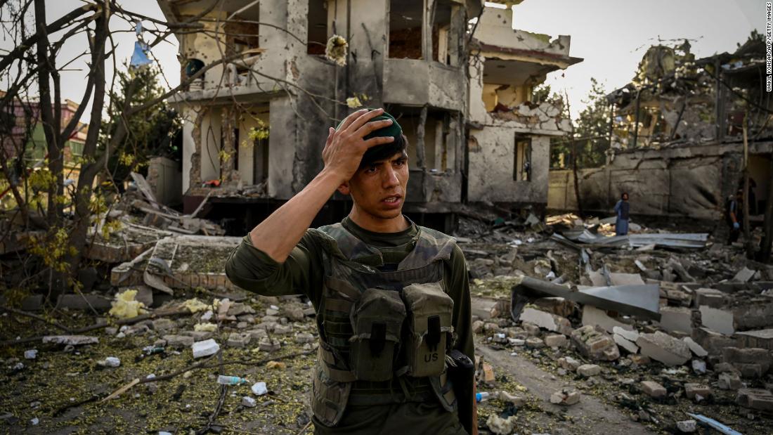 An Afghan security officer stands guard at the site of a car bomb explosion in Kabul on August 4. &lt;a href=&quot;https://www.cnn.com/2021/08/03/middleeast/taliban-afghanistan-us-airstrikes-helmand-herat-intl/index.html&quot; target=&quot;_blank&quot;&gt;A car bomb exploded near the home of Afghanistan&#39;s acting defense minister&lt;/a&gt; the day before. In the weeks prior, Kabul had largely been spared from the violence hitting other parts of Afghanistan.