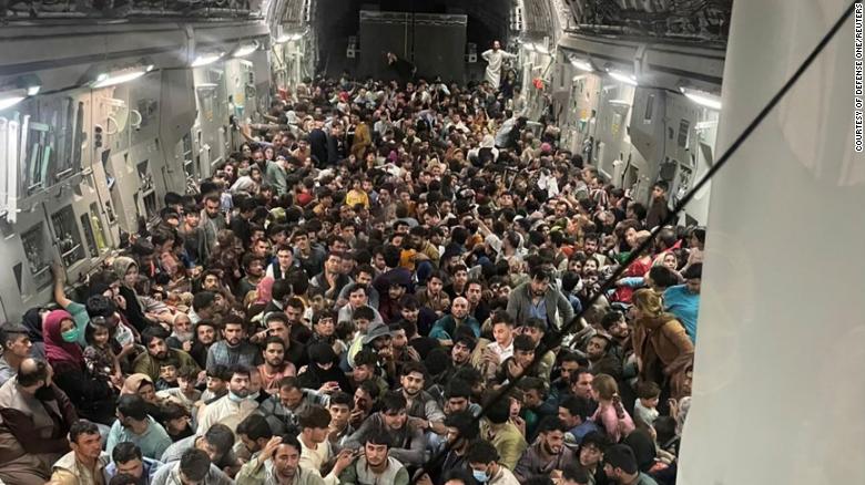 Military evacuation flight shown in photo packed with Afghans carried a record number of people
