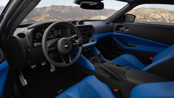 The interior of the new Nissan Z has three analog gauges that, designer Alfonso Albaisa said, are a nod to the car's early roots. The center console has a digital touchscreen, though.