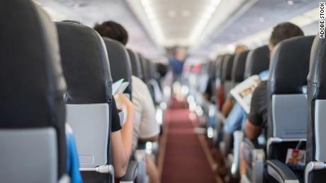 CNN reporter measures airline seats and puts them to the comfort test 