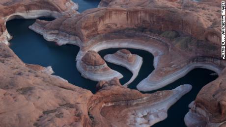 As severe drought grips parts of the Western United States, a below-average flow of water is expected to flow through the Colorado River Basin into two of its biggest reservoirs, Lake Powell and Lake Mead.