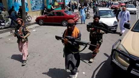 Taliban fighters patrol  Kabul on Thursday, Afghanistan&#39;s Independence Day.