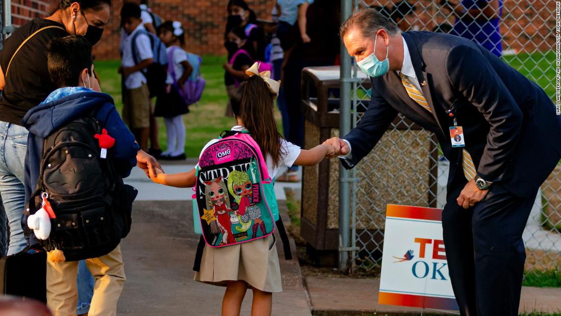 Here's how three school districts are defying their state's ban on mask mandates