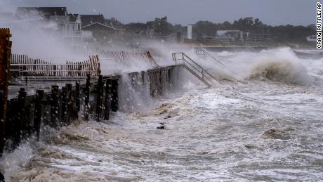 Waves pound a seawall in Montauk, New York, on Sunday, August 22, as Tropical Storm Henri affects the Atlantic coast. 