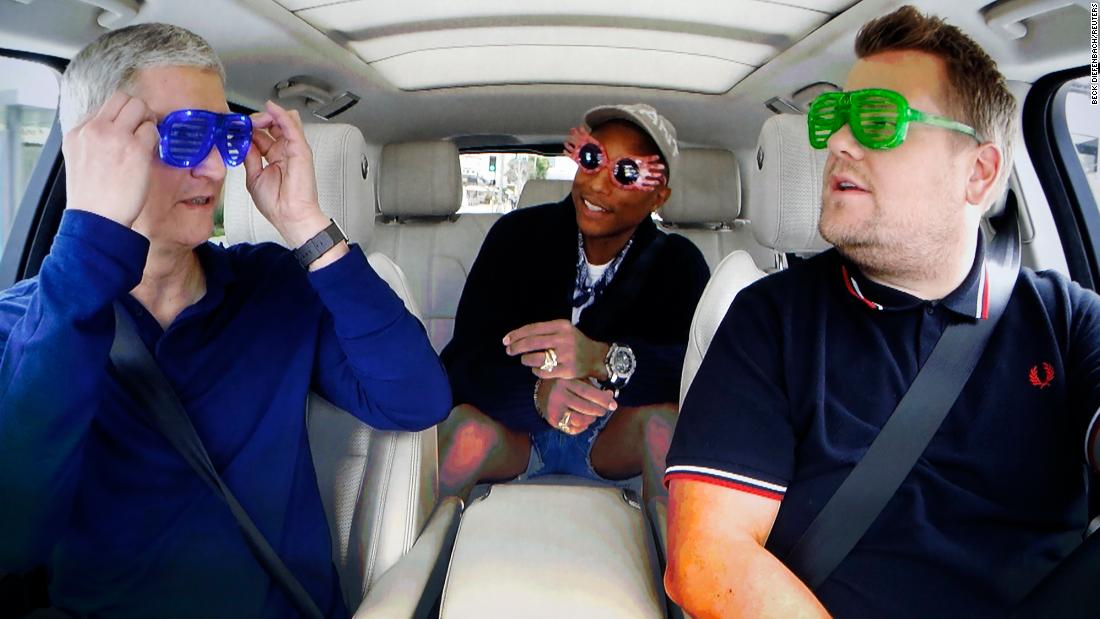 Cook with James Corden and Pharrell during a taped comedy bit shown on a projection screen during an Apple event in San Francisco on September 7, 2016. 
