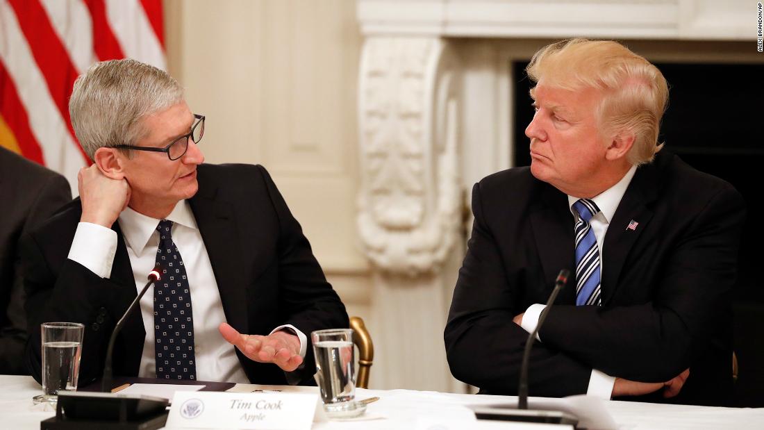 President Donald Trump listens as Cook speaks during an American Technology Council roundtable in the State Dinning Room of the White House on June 19, 2017.