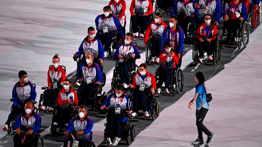 Russian athletes take part in the traditional parade during the opening ceremony. Russian athletes at these Paralympics are officially recognized as members of the Russian Paralympic Committee. That&#39;s because in 2019, the World Anti-Doping Agency banned Russia from all international sporting competitions, including the Olympics, for doping non-compliance. Russian athletes can&#39;t compete under their country&#39;s name, flag and national anthem until December 2022.