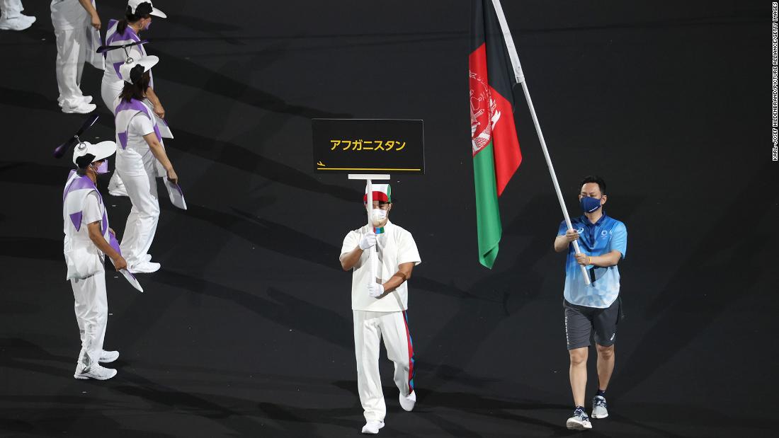 &lt;a href=&quot;https://www.cnn.com/2021/08/24/sport/paralympics-afghanistan-tokyo-2020-preview-spt-intl/index.html&quot; target=&quot;_blank&quot;&gt;The flag of Afghanistan is presented&lt;/a&gt; by volunteers at the ceremony. Afghanistan was the focus of the world&#39;s attention after &lt;a href=&quot;http://www.cnn.com/2021/08/16/middleeast/gallery/taliban-afghanistan/index.html&quot; target=&quot;_blank&quot;&gt;the Taliban seized the capital,&lt;/a&gt; and Afghan athletes pulled out of the Paralympics due to flights being canceled from the country. &quot;We would like to have them here. Unfortunately it is not possible, but they will be here in spirit,&quot; said Andrew Parsons, president of the International Paralympic Committee, on the eve of the ceremony.