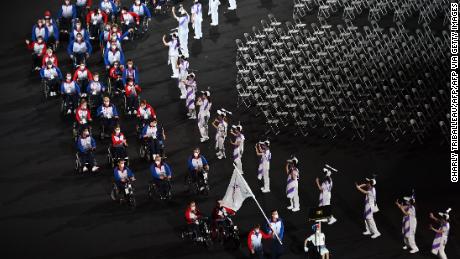 RPC team members parad during the opening ceremony for the Tokyo 2020 Paralympic Games at the Olympic Stadium in Tokyo on August 24, 2021.