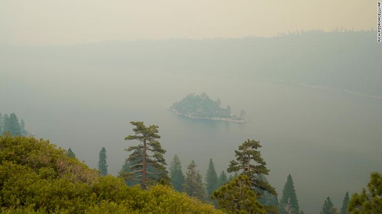 See picturesque Lake Tahoe obscured by smoke from wildfire