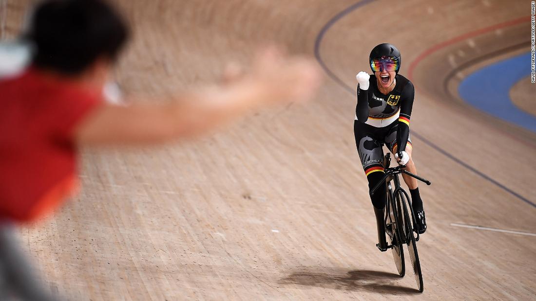 German cyclist Denise Schindler celebrates after winning bronze in a pursuit race on August 25.
