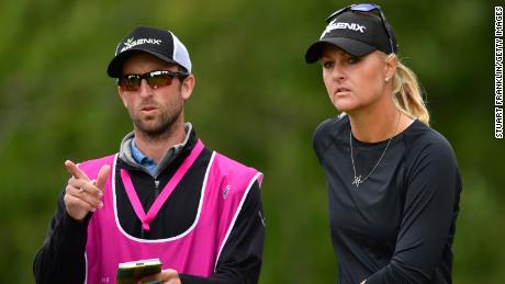 Nordqvist discusses a shot with her caddie during the final round of The Evian Championship in 2017.