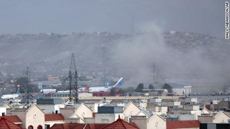 Smoke rises from explosion outside the airport in Kabul, Afghanistan, on Thursday, August 26, 2021. 