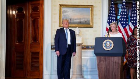 Cleta Mitchell speaks during an event marking the 100th Anniversary of the 19th Amendment ratification with President Donald Trump, left, in the Blue Room of the White House on August 18, 2020.