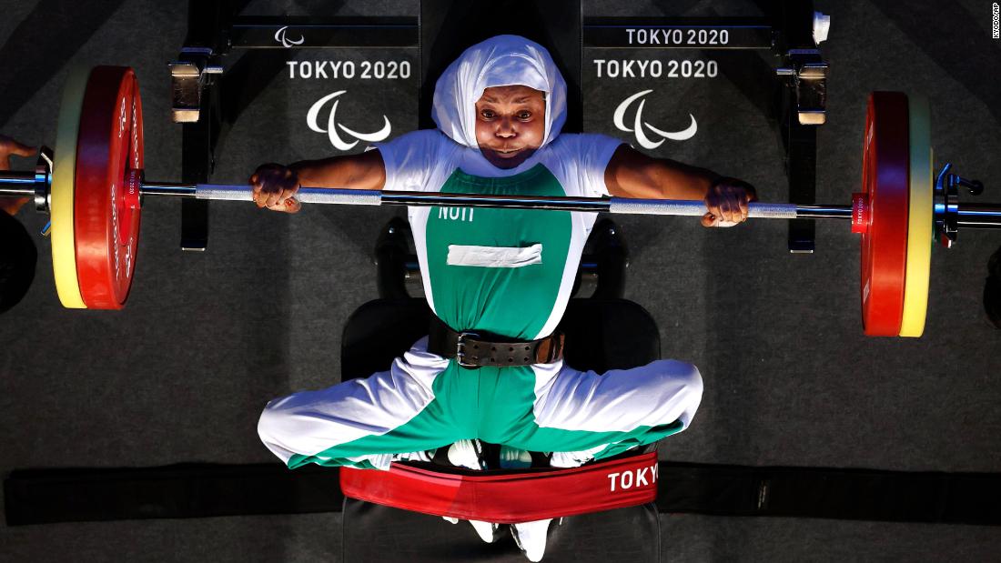 Nigerian powerlifter Latifat Tijani competes on August 26. She won gold in her weight class.