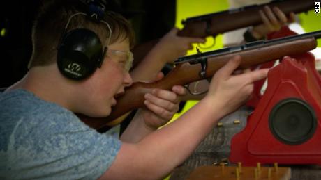 Ashton Morse, 11, fires a gun at a 4-H  Club training event in Sandgate, Vermont.