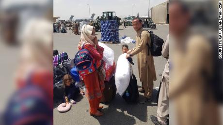 Rafiullah Stanikzai and his family are pictured being evacuated from Kabul on Thursday, August 19.