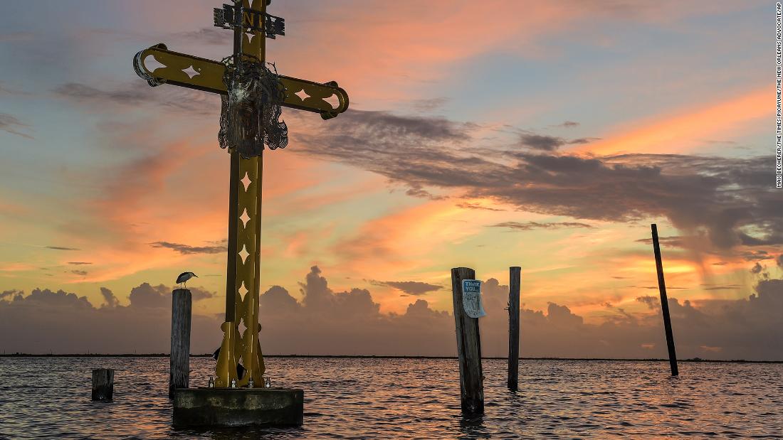 Dawn breaks over a Hurricane Katrina memorial at Shell Beach in St. Bernard, Louisiana, on August 28. &lt;a href=&quot;https://www.cnn.com/2020/08/29/us/gallery/hurricane-katrina/index.html&quot; target=&quot;_blank&quot;&gt;Katrina made landfall&lt;/a&gt; on August 29, 2005.