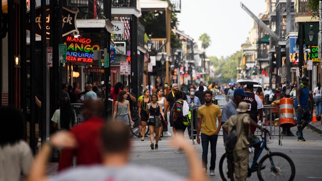 People walk down Bourbon Street in New Orleans on Saturday. &lt;a href=&quot;https://www.cnn.com/2021/08/27/us/new-orleans-hurricane-ida-preparations/index.html&quot; target=&quot;_blank&quot;&gt;Evacuation was voluntary&lt;/a&gt; for parts of the city inside its flood protection system. Other areas were under a mandatory evacuation order.