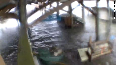 Sharlette Landry&#39;s home security cameras captured footage of water quickly rising in her home in Grand Isle, Louisiana, before it lost power ahead of Hurricane Ida on August 29, 2021.