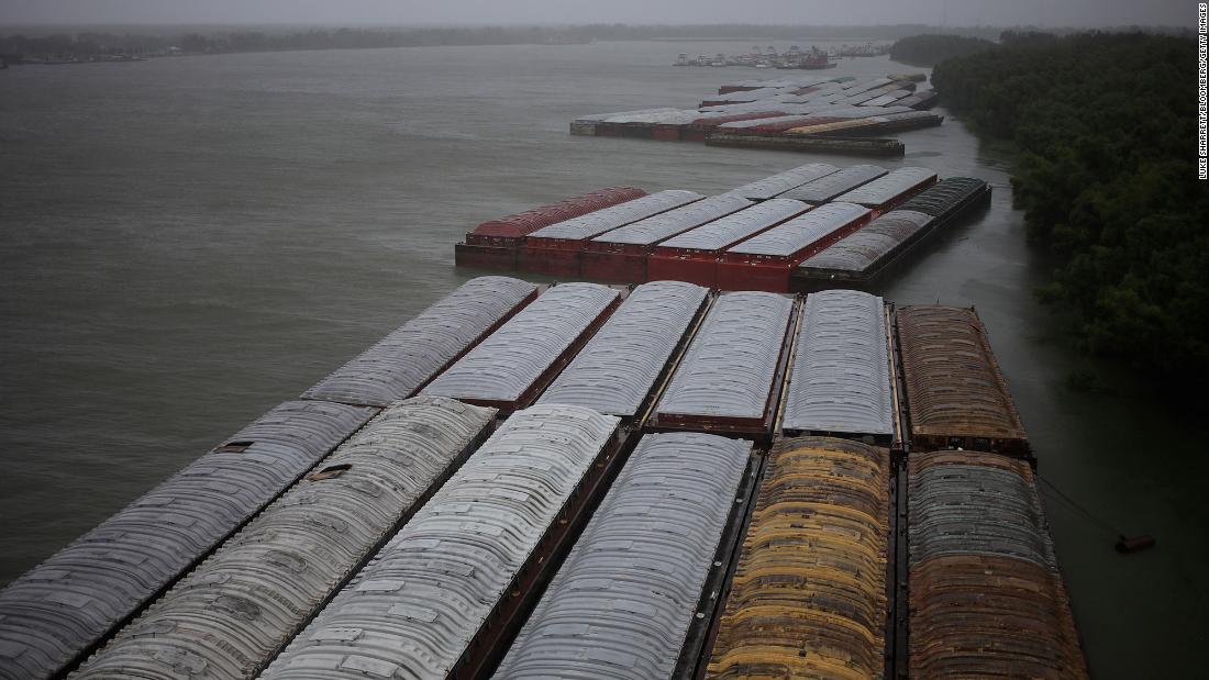 Barges are seen docked on the Mississippi River as Hurricane Ida hits Destrehan, Louisiana, on Sunday.