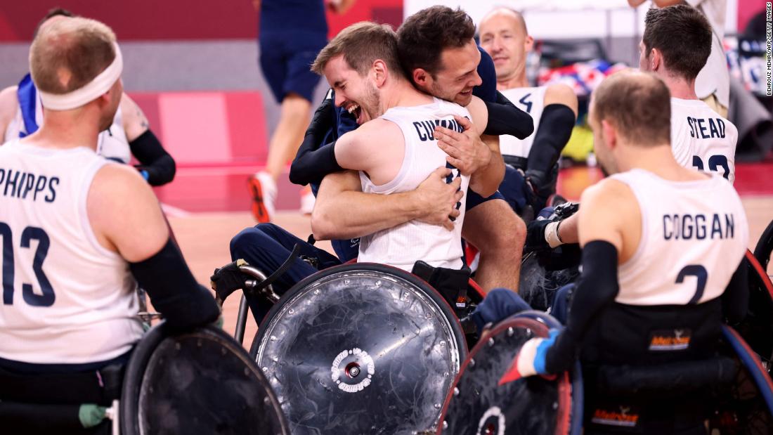 British players celebrate after defeating the United States in the wheelchair rugby gold-medal match on Sunday, August 29.