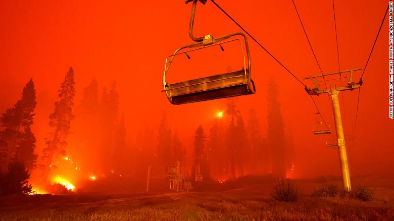 A chairlift at Sierra-at Tahoe ski resort sits idle as the Caldor Fire moves through the area on August 30, 2021 in Twin Bridges, California.