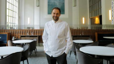 Eleven Madison Park&#39;s chef and owner Daniel Humm poses for a portrait in the dining room of the Michelin-starred restaurant on May 20, 2020. Restaurants were shuttered as the coronavirus outbreak continued in the Manhattan borough of New York. 